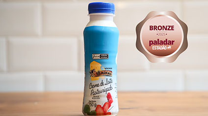 Creme de leite S&ocirc; Minas ao lado do Selo Bronze do Pr&ecirc;mio Paladar 2025